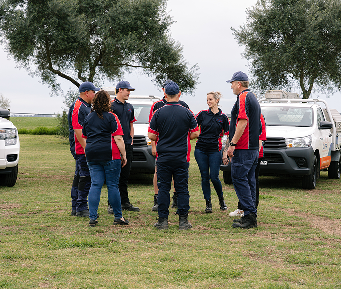 The CPR Pest Management team with their service vehicles